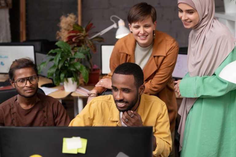 medium-shot-people-looking-computer