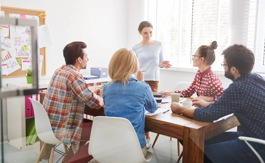 Happy customers at a marketing performance review.